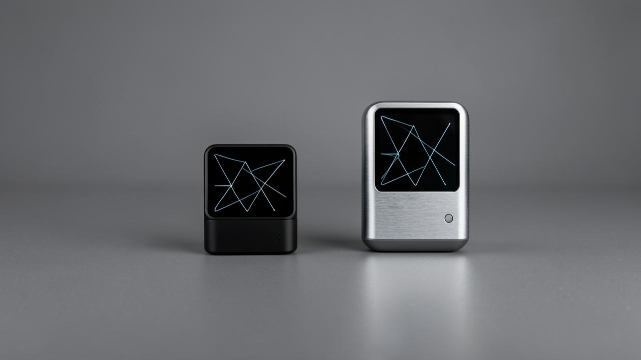Two hardware wallets on a desk